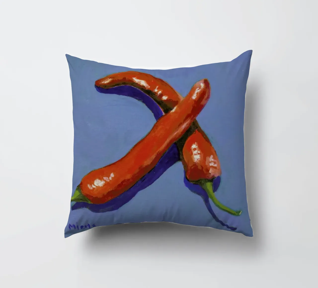 Chillis on Blue decorative cushion by Miche Watkins