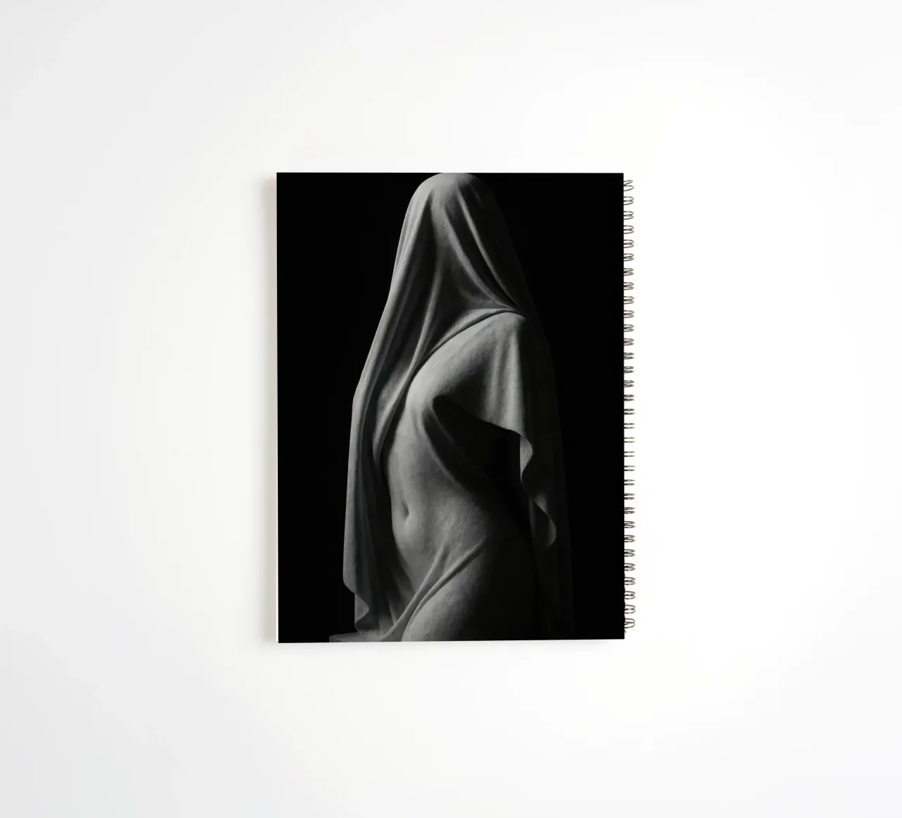Sculpture draped in light and shadow spiral notebook by Black & White