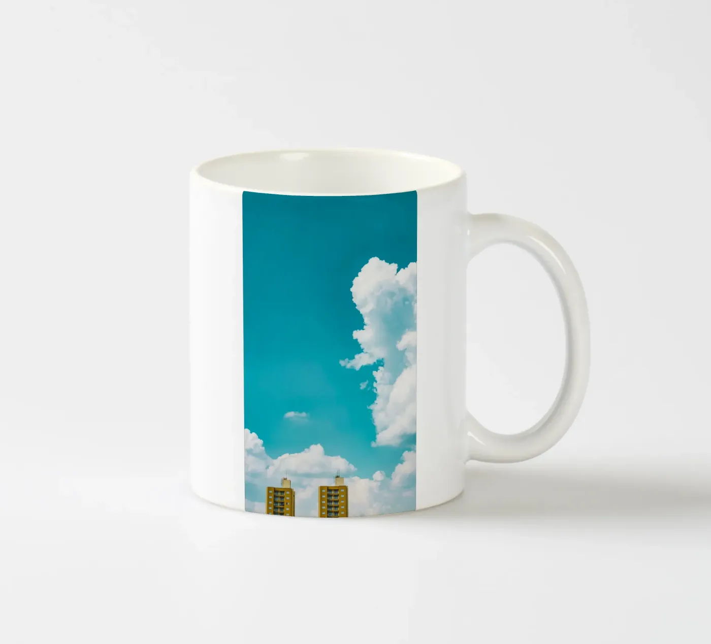 blue sky clouds ceramic mug by Bleu