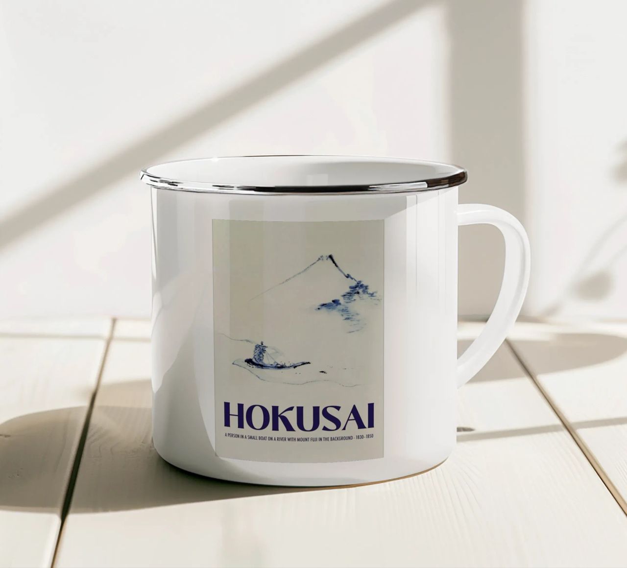 Hokusai - A Person in a Small Boat on a River with Mount Fuji in the Background III enamel mug by Vintage by JUNIQE
