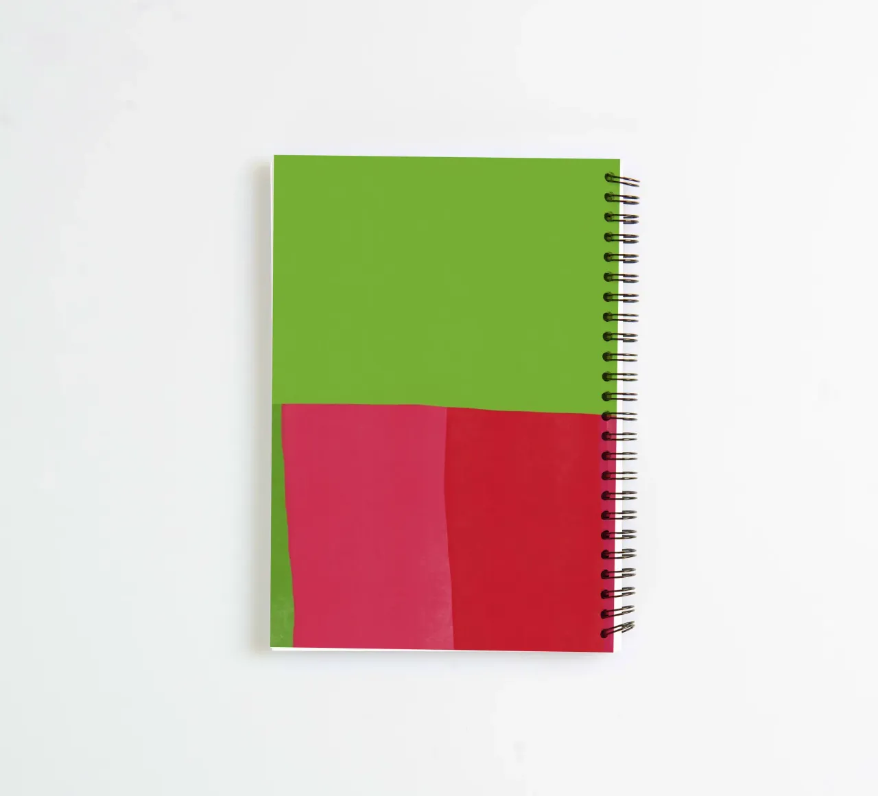 Green and red opposite color spiral notebook by Little Dean