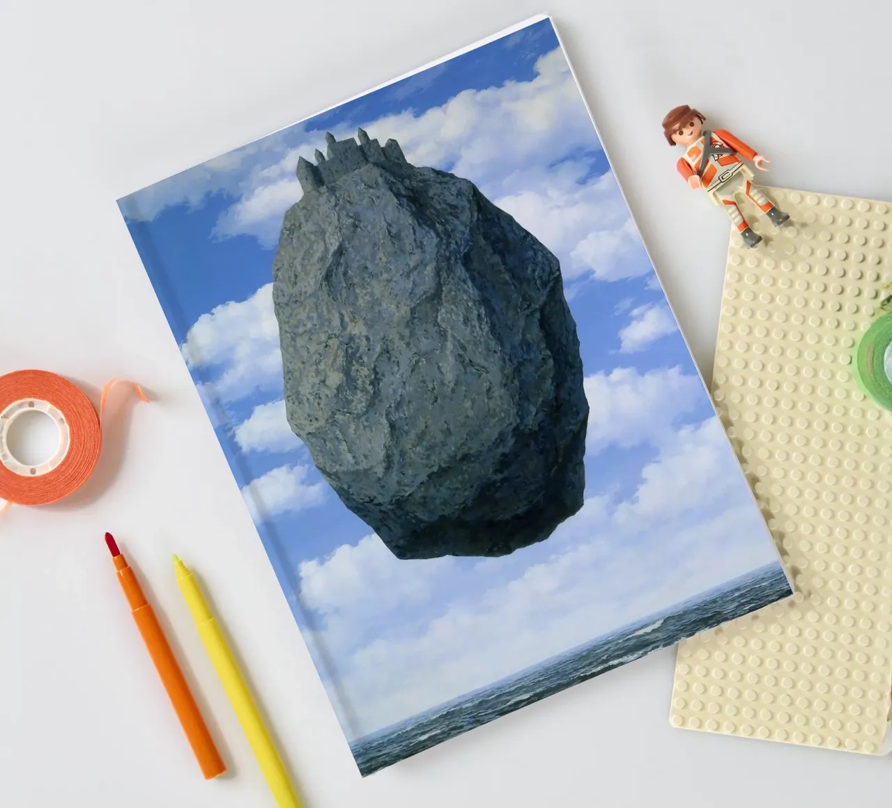 René Magritte’s "The Castle in the Pyrenees" (1959) notebook by Classic Art Prints