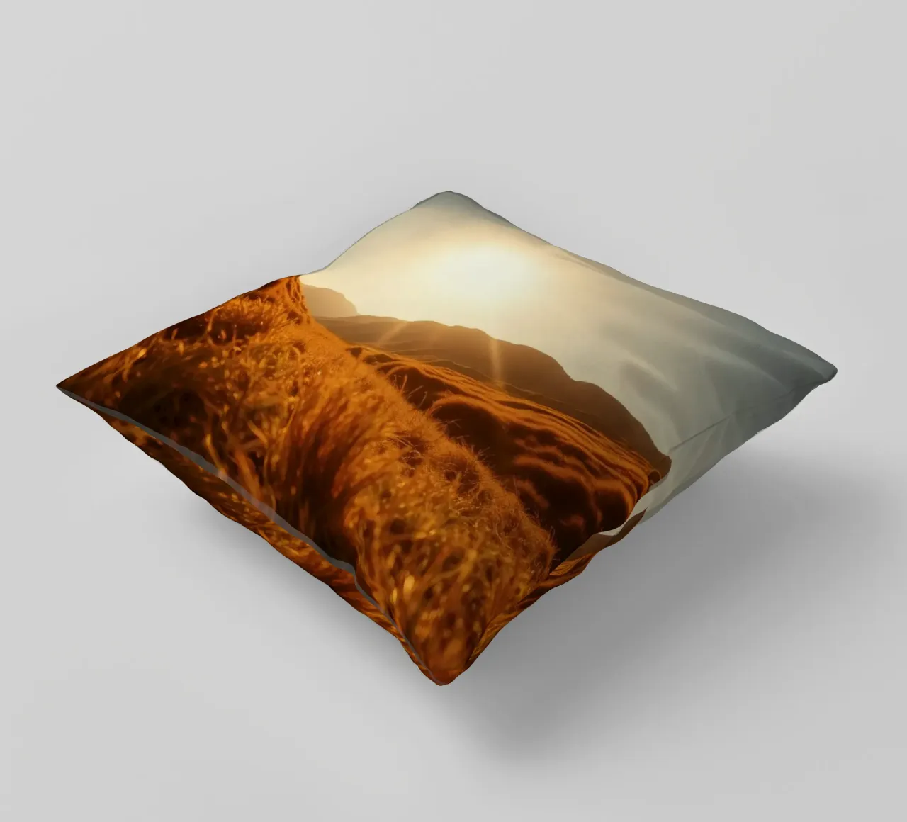 tramonto su una valle tranquilla circondata da montagne maestose cuscino da DesignDoodle