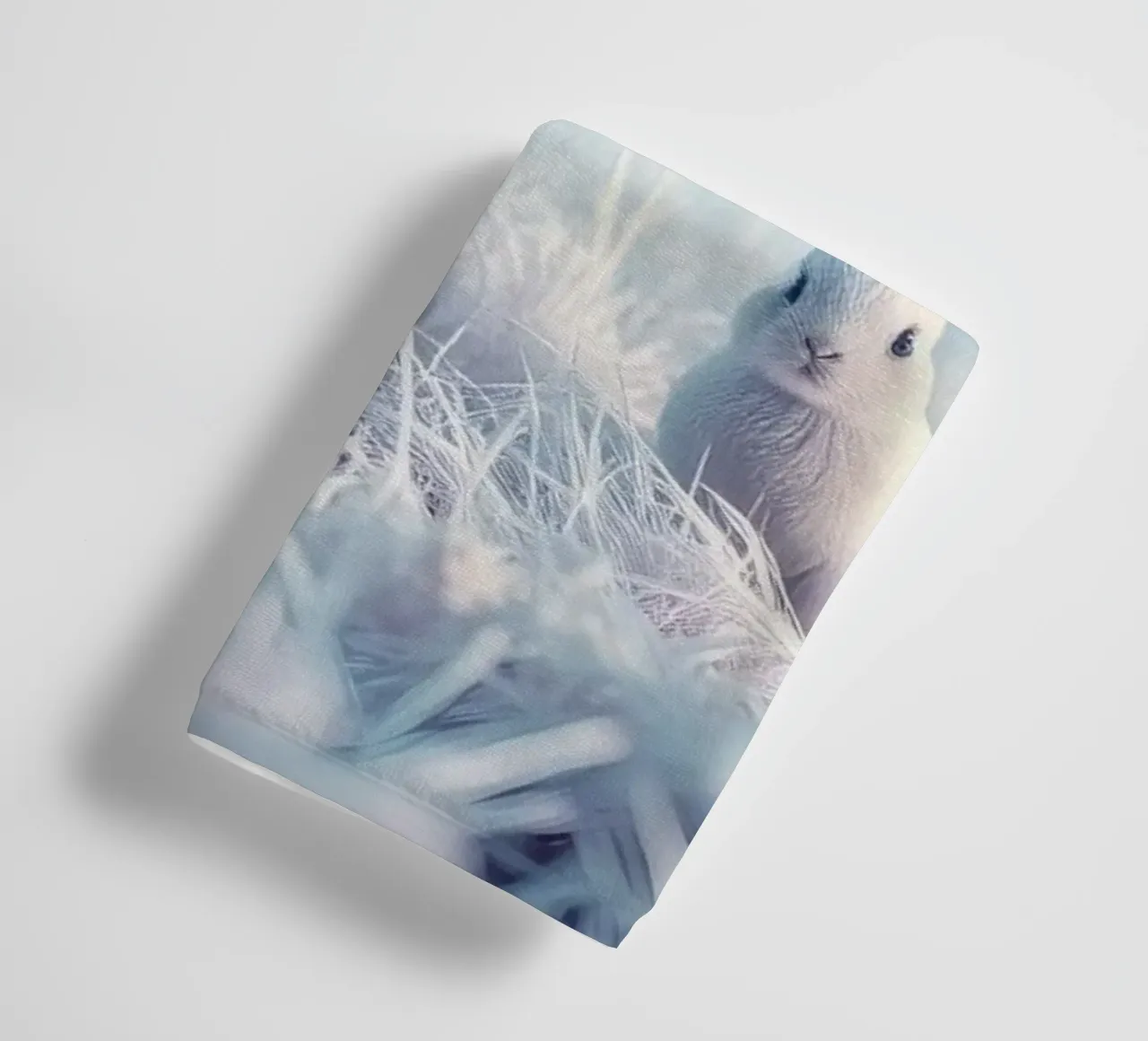 Snowy landscape with a rabbit in a mystical forest towel by DesignDoodle