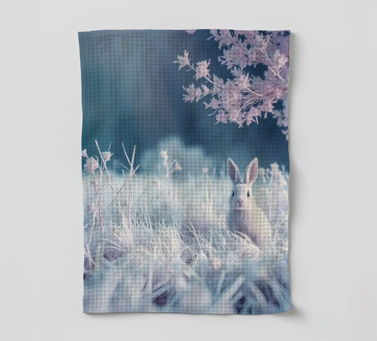 Paisaje nevado con un conejo en un bosque místico paño de cocina de DesignDoodle