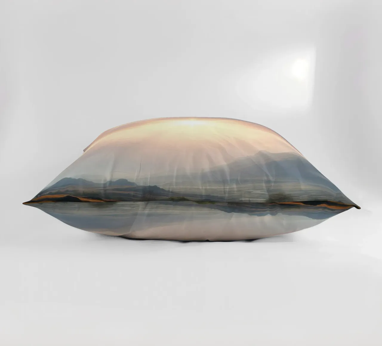 Sunlight breaks through clouds illuminating a calm valley decorative cushion by DesignDoodle