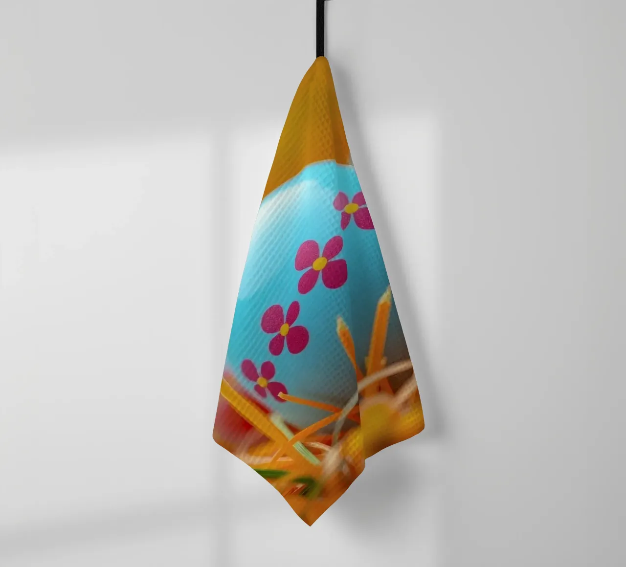 Uova decorate e colorate immerse in un'erba arancione e vivace. canovaccio da cucina da DesignDoodle