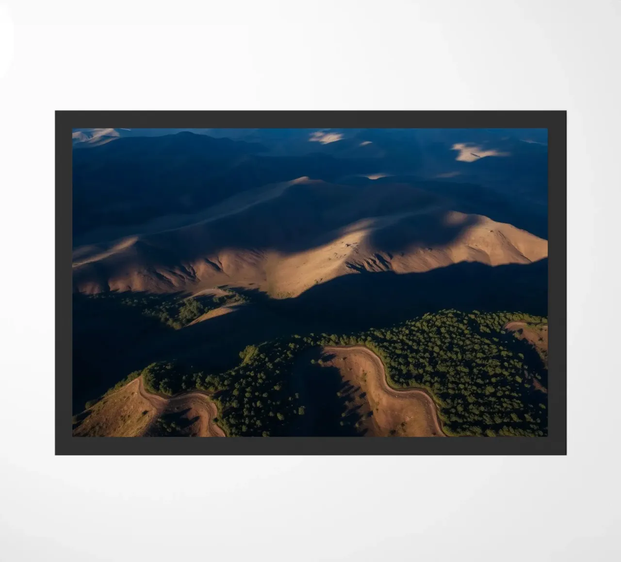 Breathtaking aerial view of rolling hills and winding roads doormat by DesignDoodle