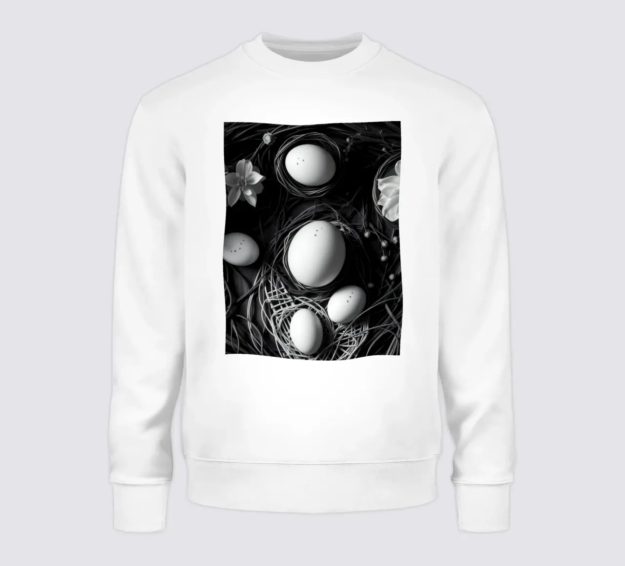 Elegant arrangement of eggs and flowers in a natural setting sweatshirt by DesignDoodle