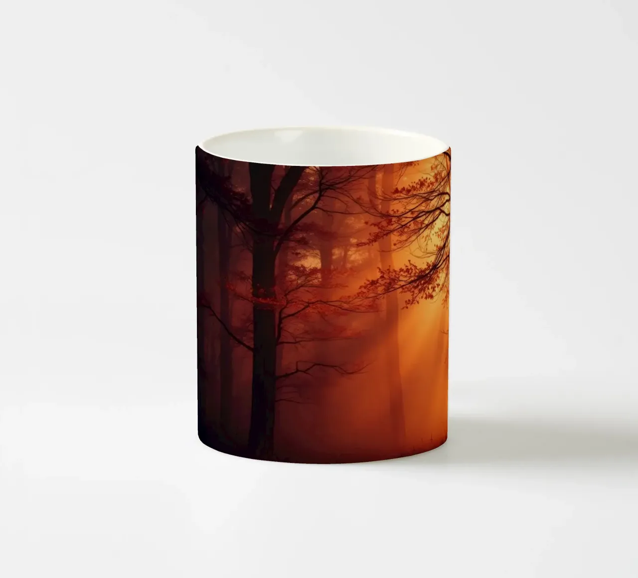 foresta illuminata da una calda luce arancione al crepuscolo tazza in ceramica da DesignDoodle