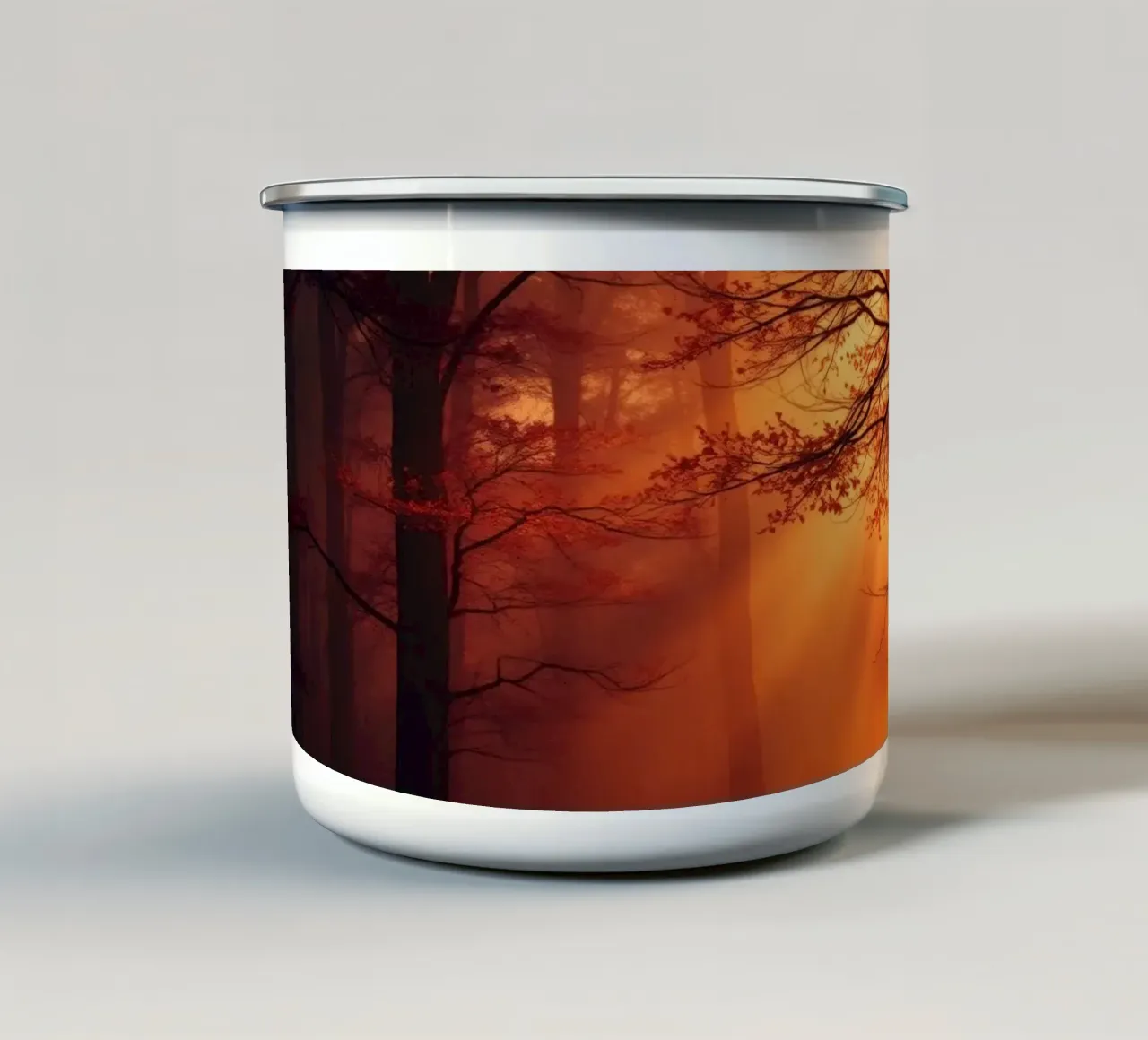 foresta illuminata da una calda luce arancione al crepuscolo tazza in smalto da DesignDoodle
