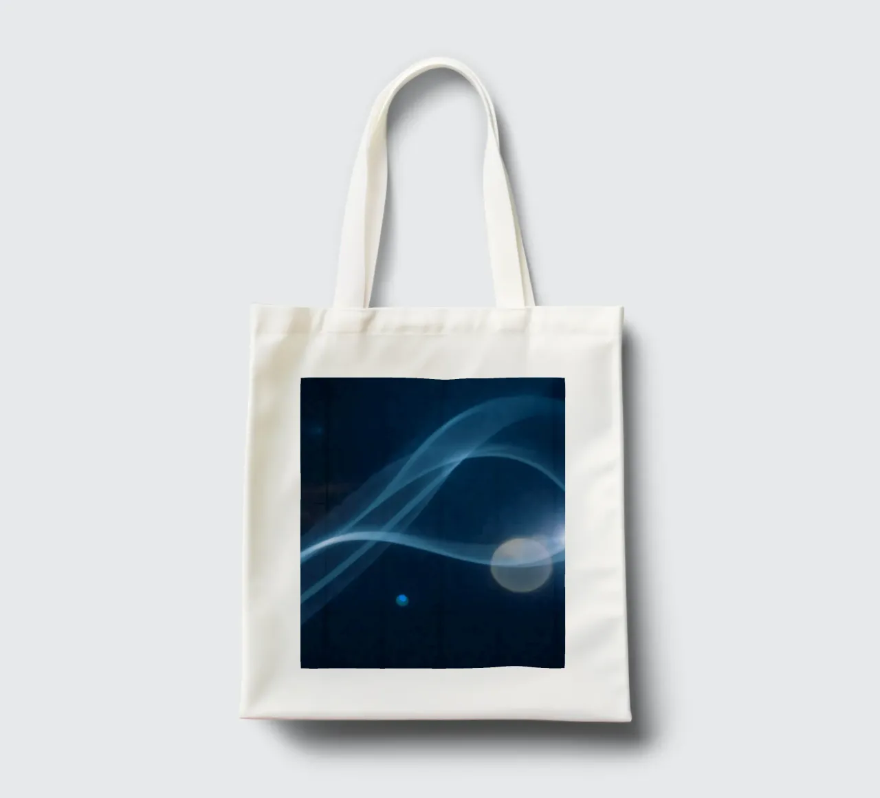 Flowing blue light waves create a calming visual effect tote bag by DesignDoodle