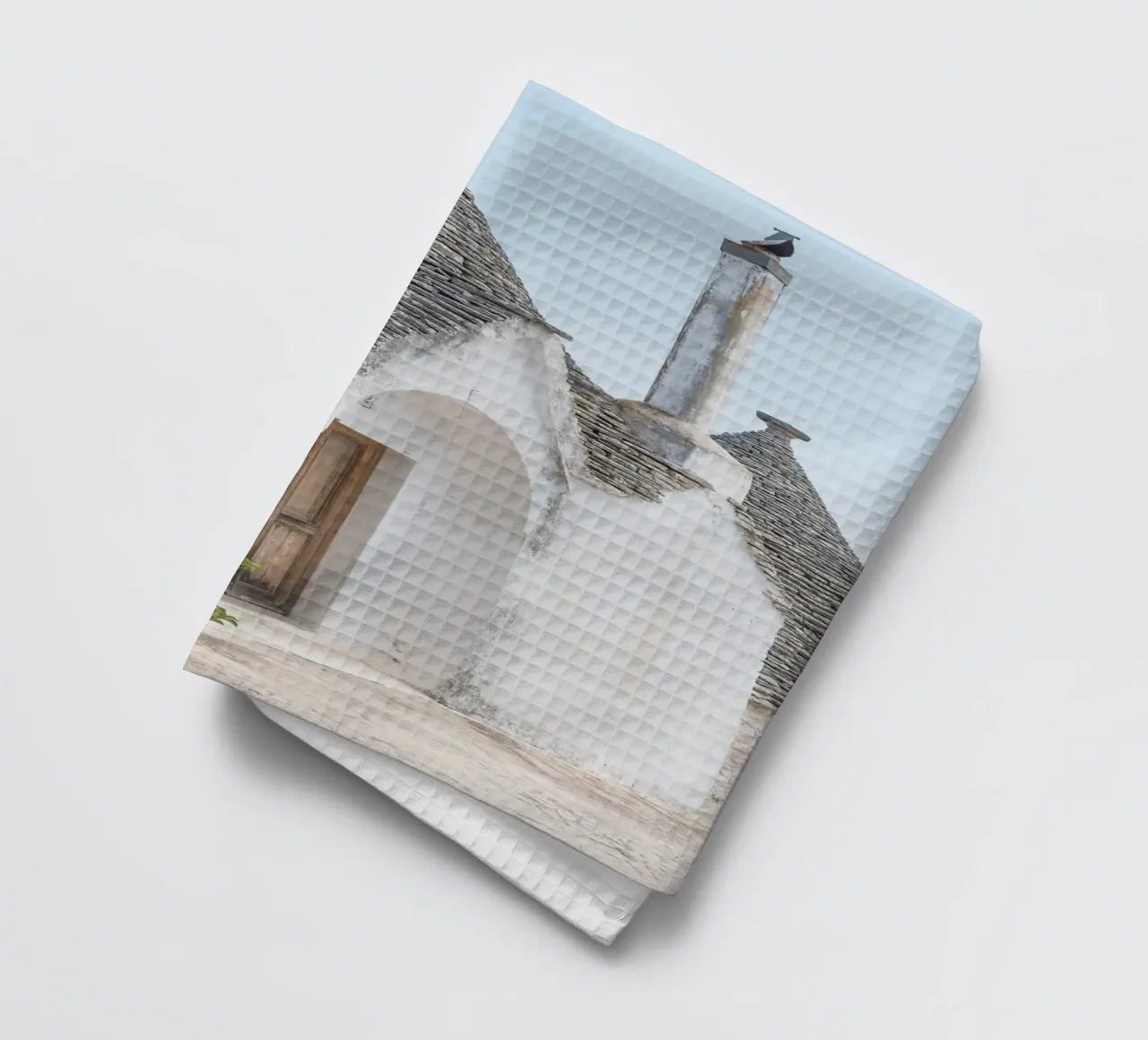 Potted plant and a trullo in Alberobello canovaccio da cucina da photolovers