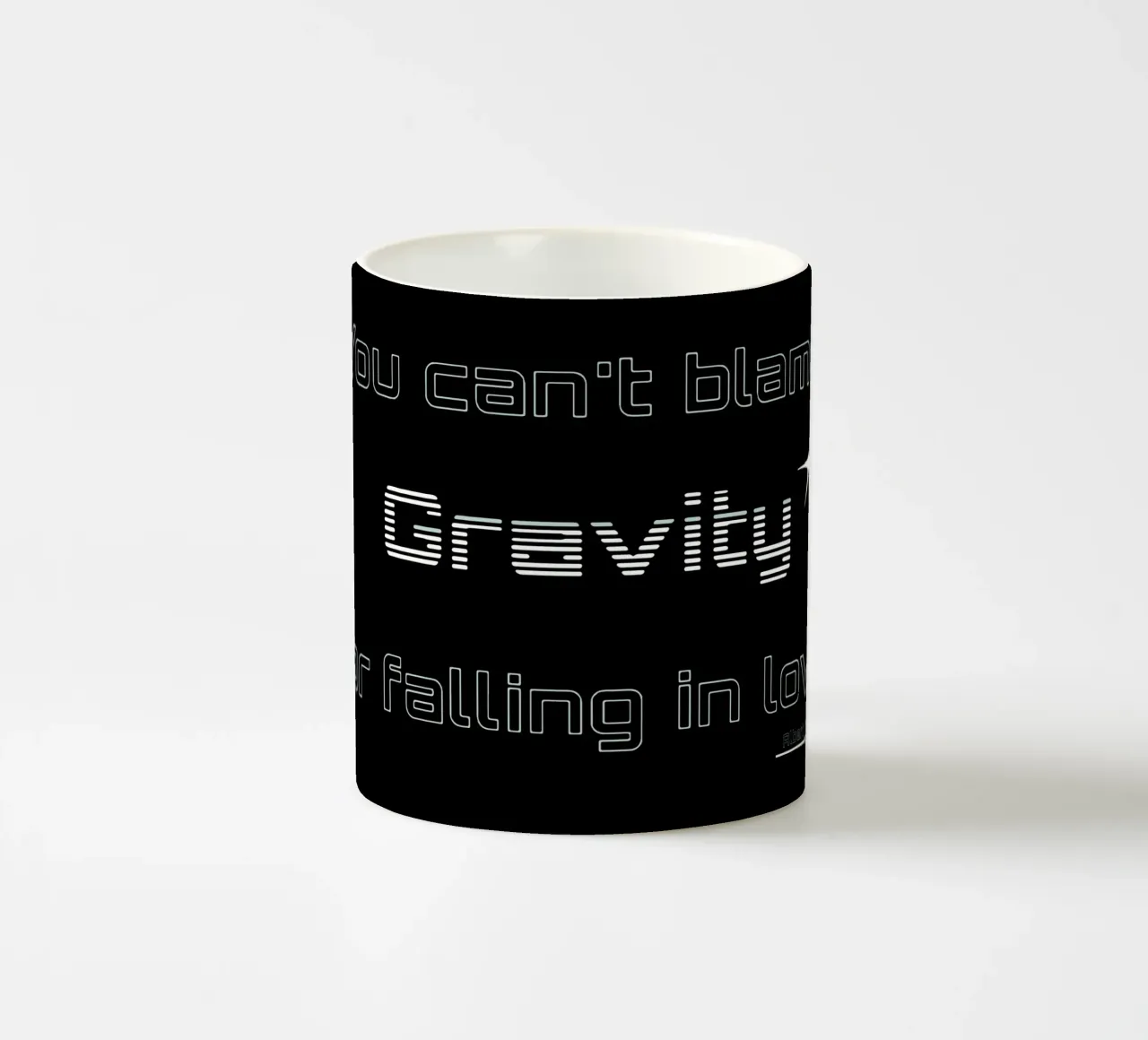 Gravity ceramic mug by Gunawan Rb