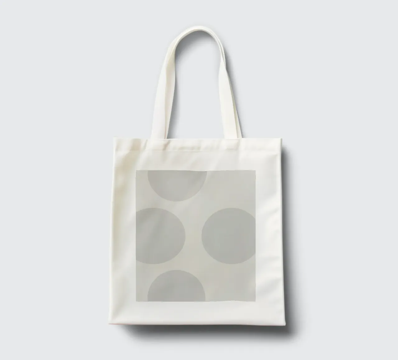 Subtle polka dot pattern on a light background tote bag by DesignDoodle