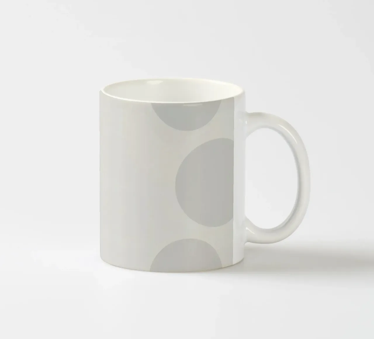 Subtle polka dot pattern on a light background ceramic mug by DesignDoodle
