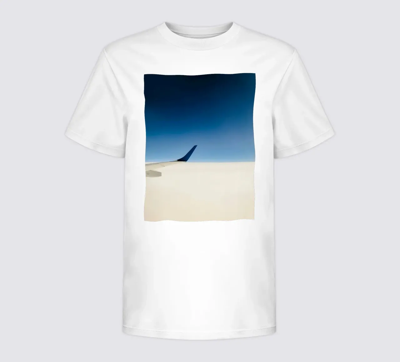 airplane clouds kids t-shirt by Bleu