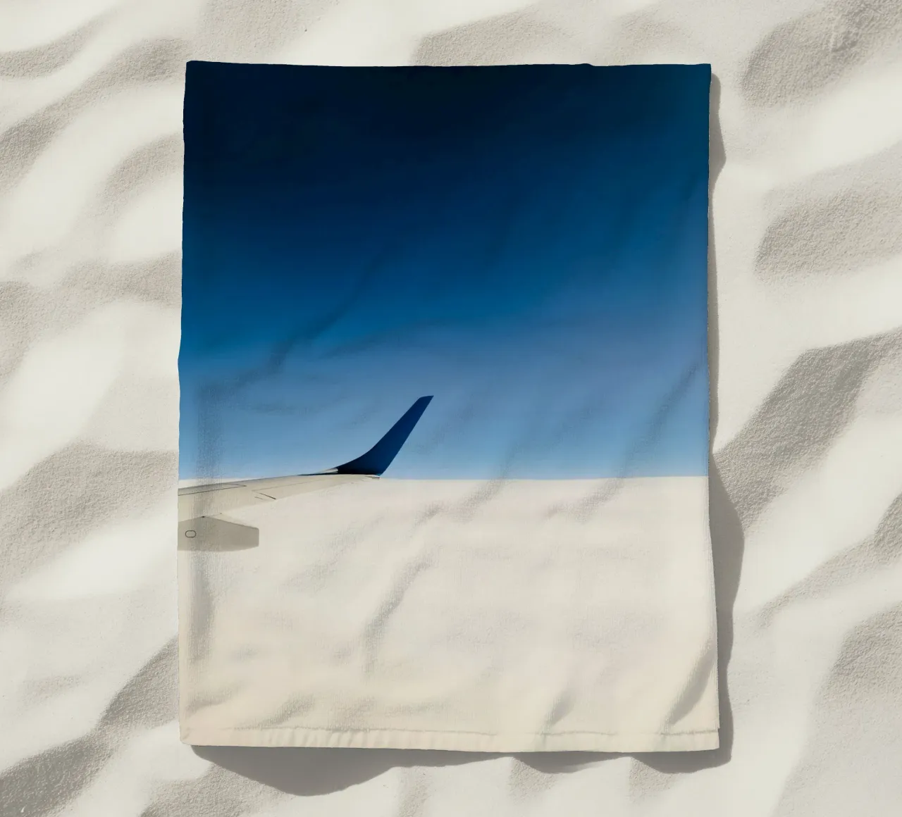 airplane clouds beach towel by Bleu