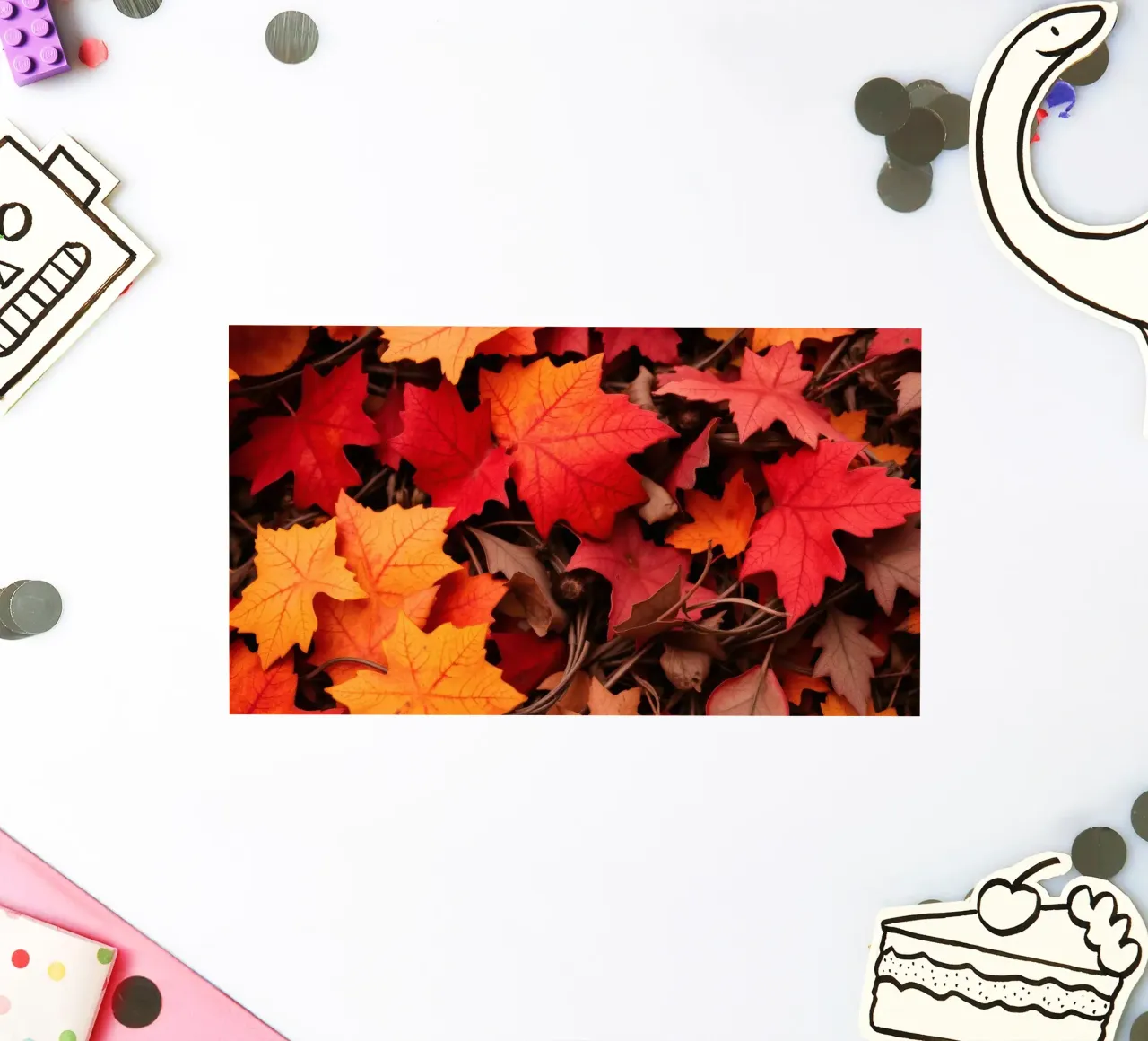 Feuilles d'automne dans des tons vibrants de rouge, d'orange et de jaune autocollant de DesignDoodle