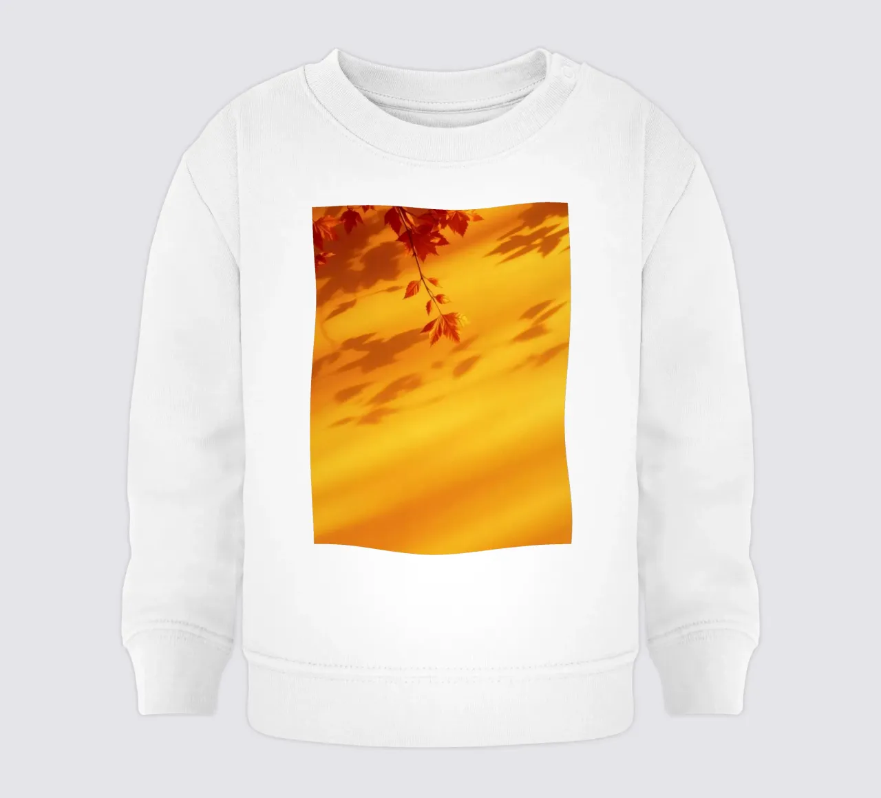 Feuilles d'automne projetant des ombres sur un fond jaune chaud sweat pour bébé de DesignDoodle