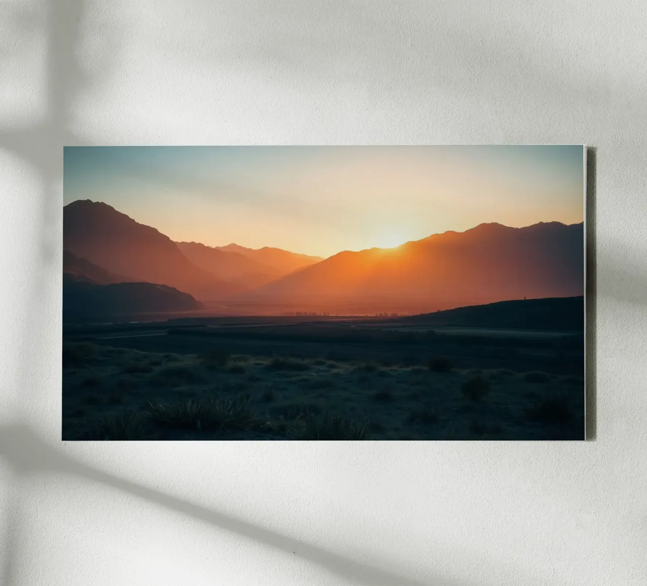 Sunset over mountains casting warm hues across the valley canvas with Floater frame by DesignDoodle