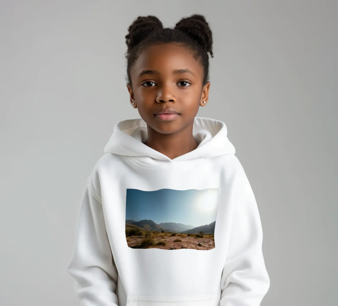 Expansive landscape view of rugged mountains & golden grass kids hoodie by DesignDoodle