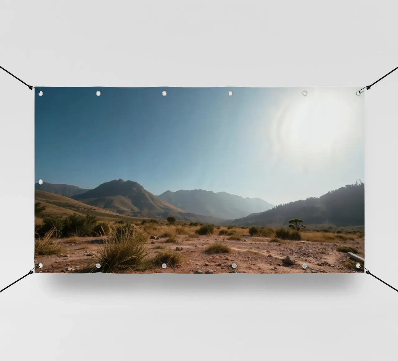 Weitläufige Landschaft mit Blick auf schroffe Berge und goldenes Gras PVC Plane von DesignDoodle