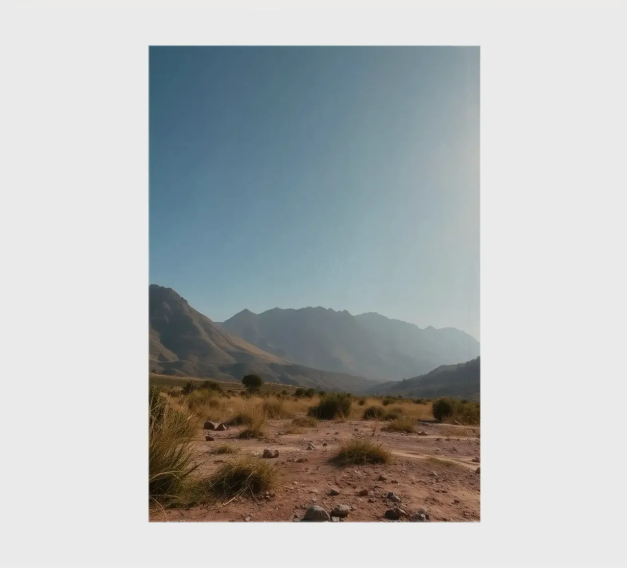 Expansive landscape view of rugged mountains & golden grass notebook by DesignDoodle