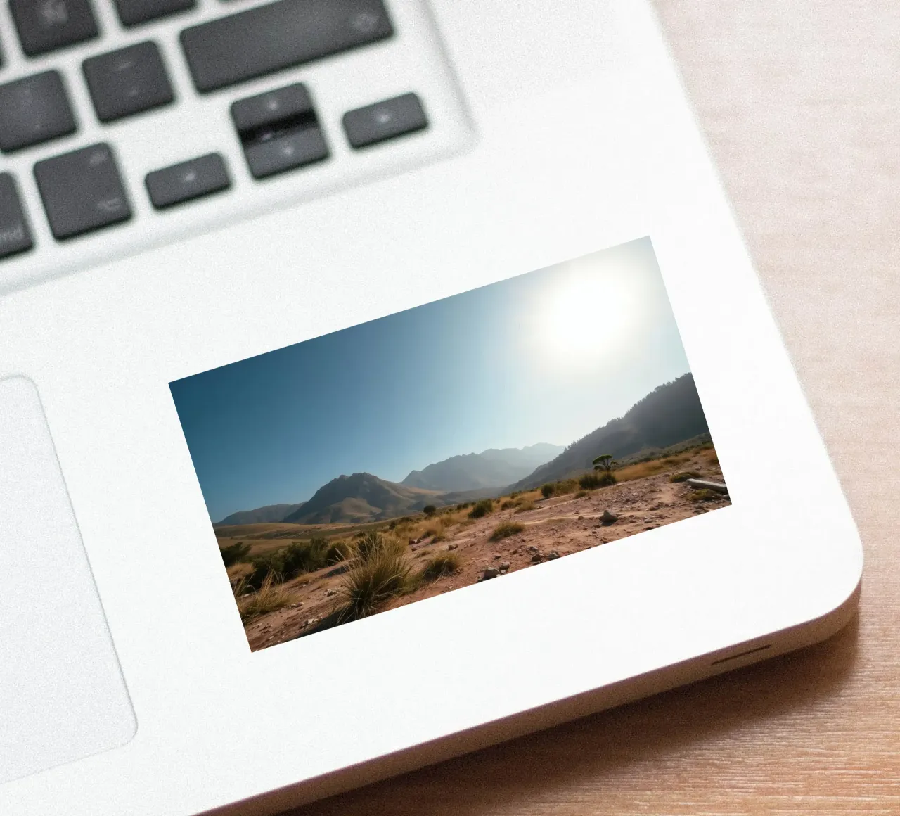 Expansive landscape view of rugged mountains & golden grass sticker by DesignDoodle