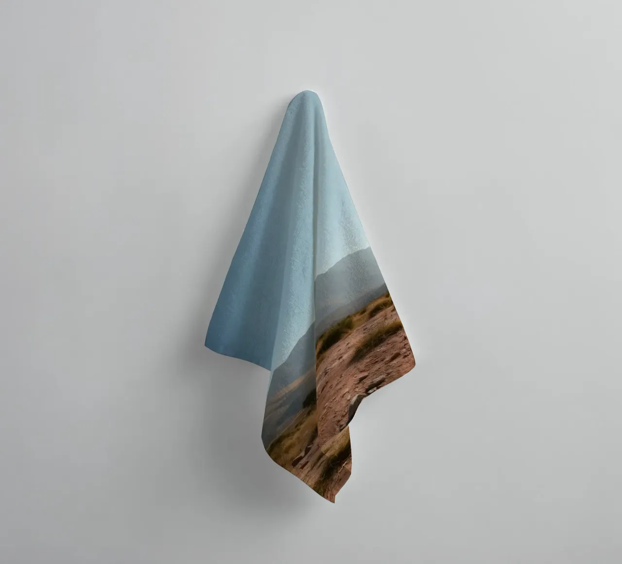 Expansive landscape view of rugged mountains & golden grass towel by DesignDoodle