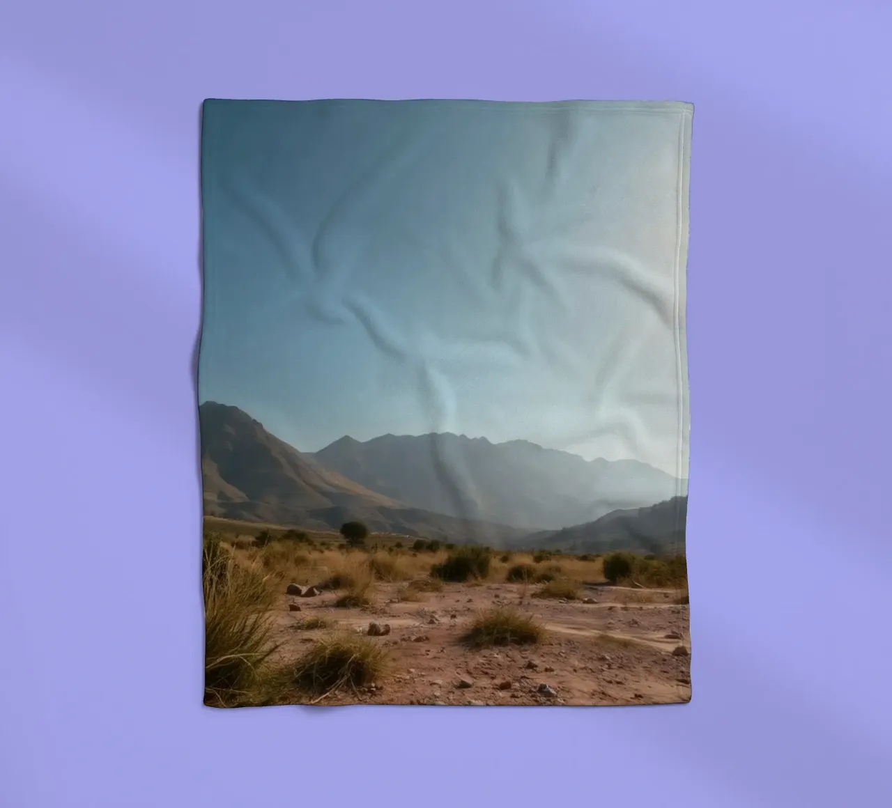 Expansive landscape view of rugged mountains & golden grass fleece blanket by DesignDoodle