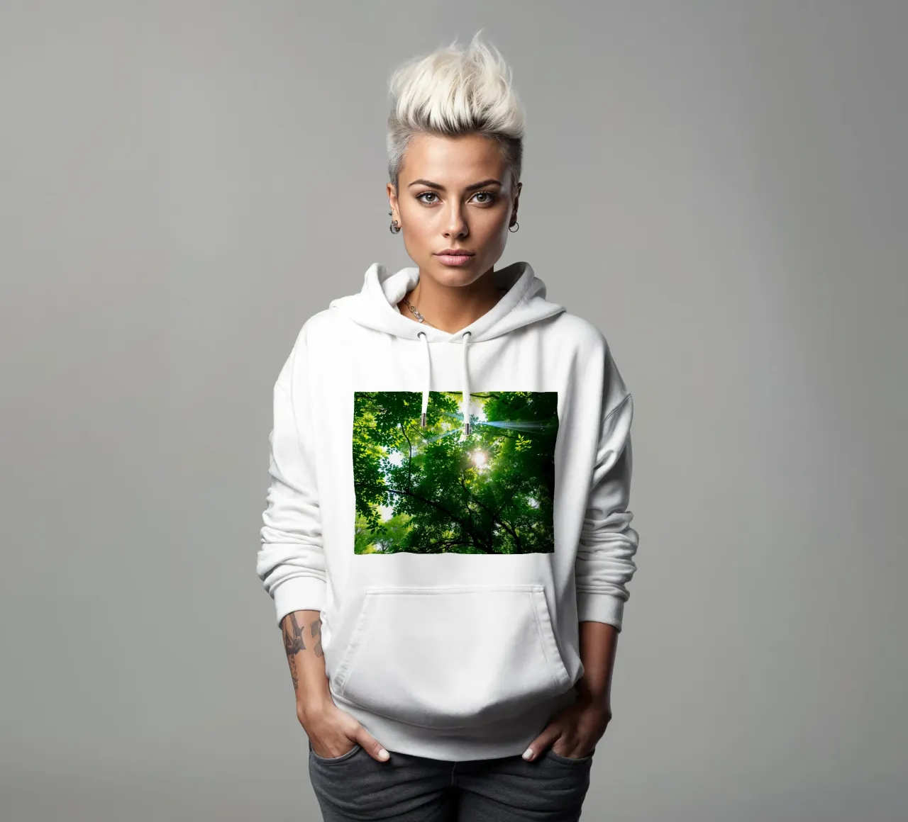 Sunlight filtering through dense green trees in calm hoodie by DesignDoodle