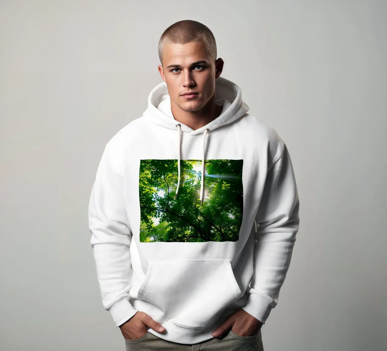 Sunlight filtering through dense green trees in calm hoodie by DesignDoodle