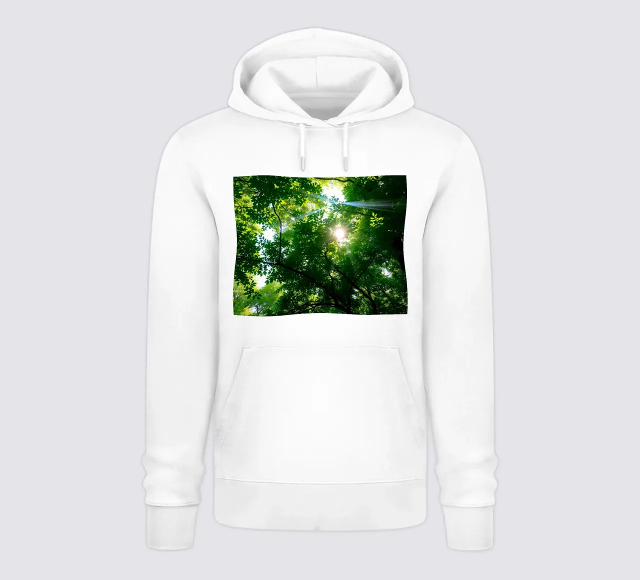 Sunlight filtering through dense green trees in calm hoodie by DesignDoodle