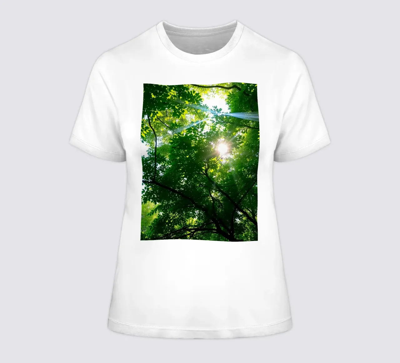 Sunlight filtering through dense green trees in calm women's fitted t-shirt by DesignDoodle