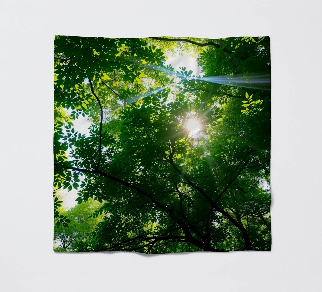 Sunlight filtering through dense green trees in calm fleece blanket by DesignDoodle