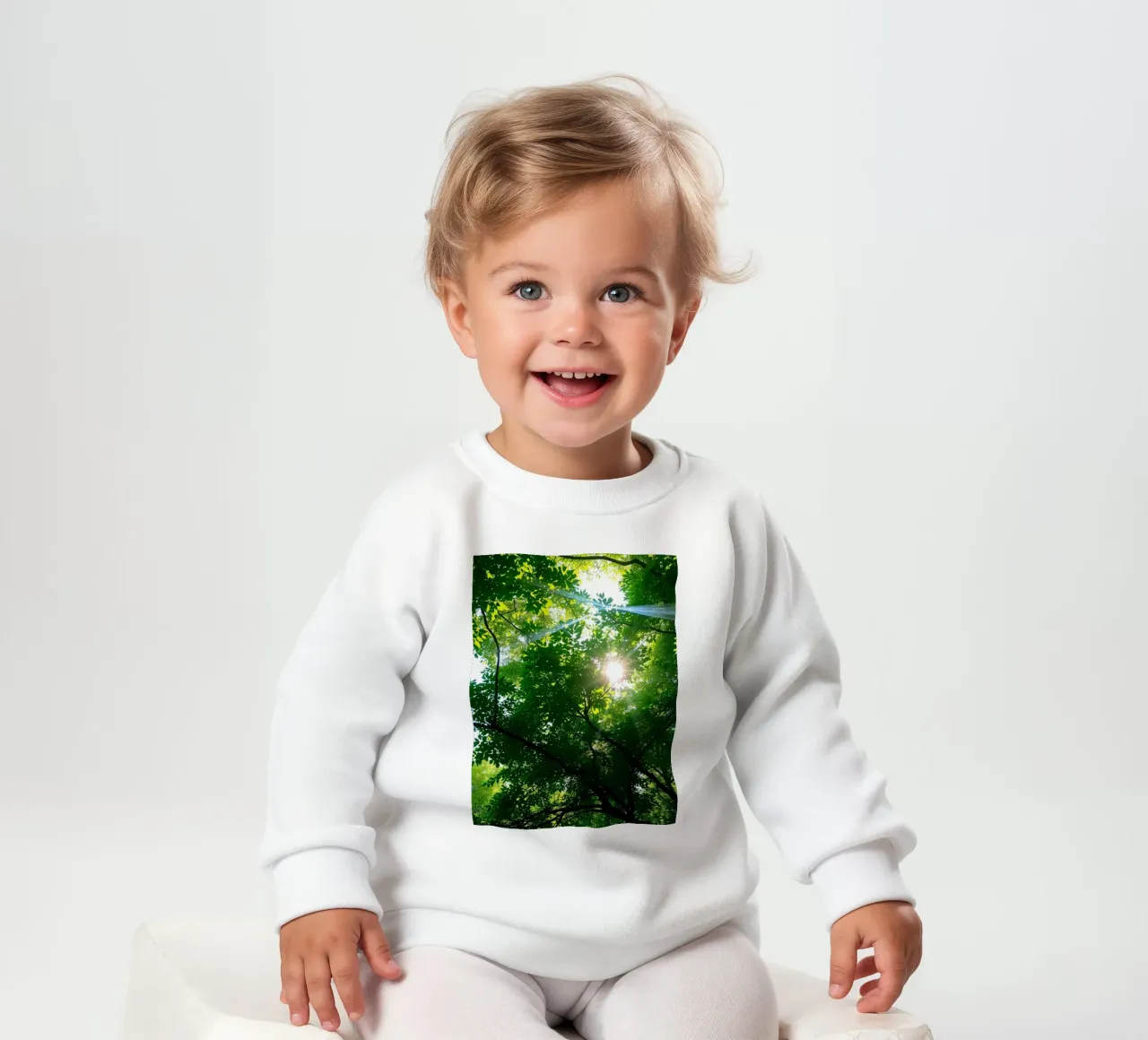 Sunlight filtering through dense green trees in calm baby sweatshirt by DesignDoodle