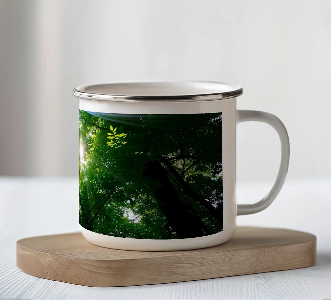 Sunlight filtering through dense green trees in calm enamel mug by DesignDoodle