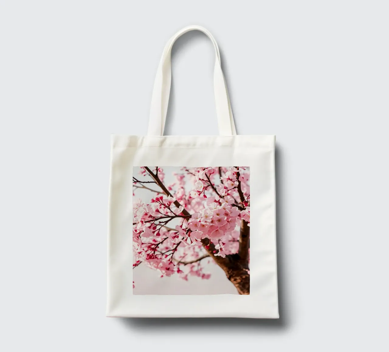 Beautiful cherry blossom tree in full bloom during spring tote bag by DesignDoodle