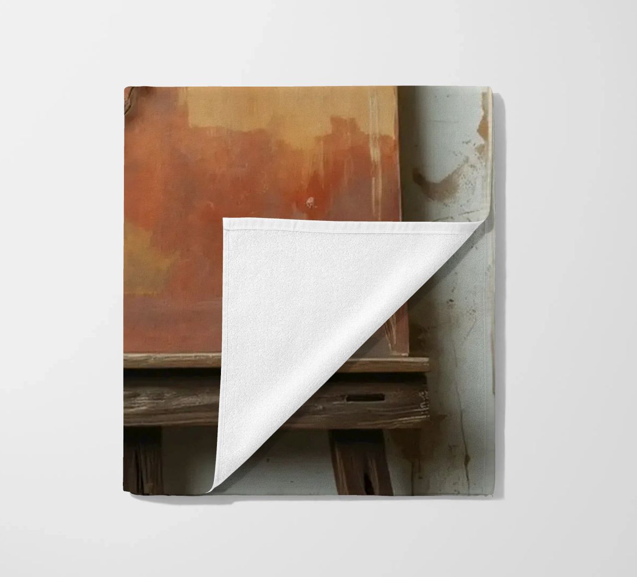 Abstract tree paintings displayed on easels in an art studio beach towel by DesignDoodle