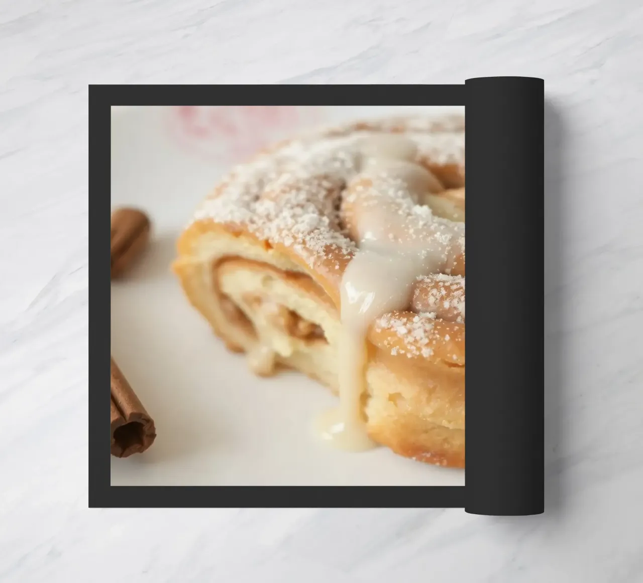 Warm cinnamon roll with cream icing and powdered sugar on a doormat by DesignDoodle