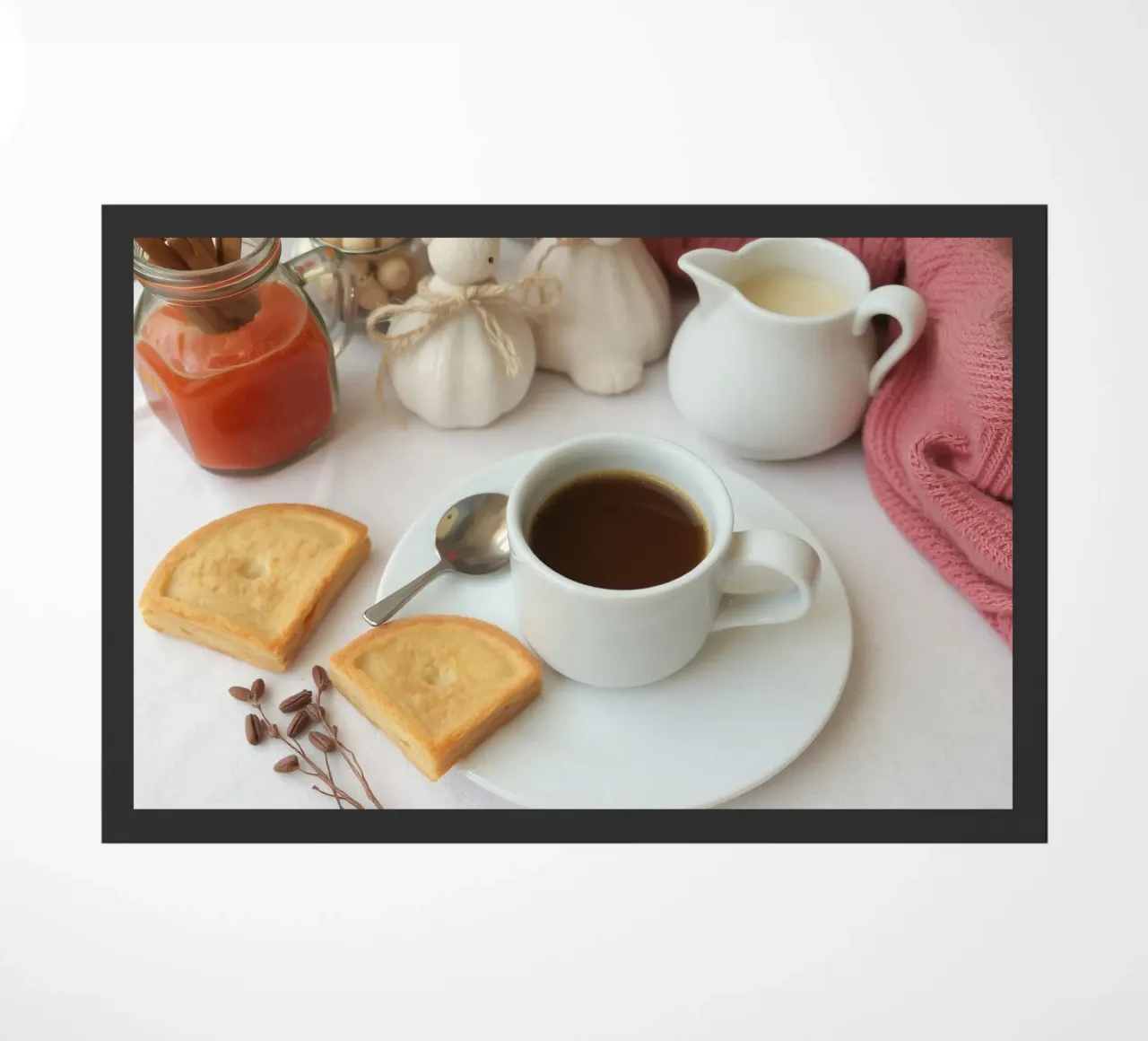 Cozy coffee and cookies setup on a table with warm colors an doormat by DesignDoodle
