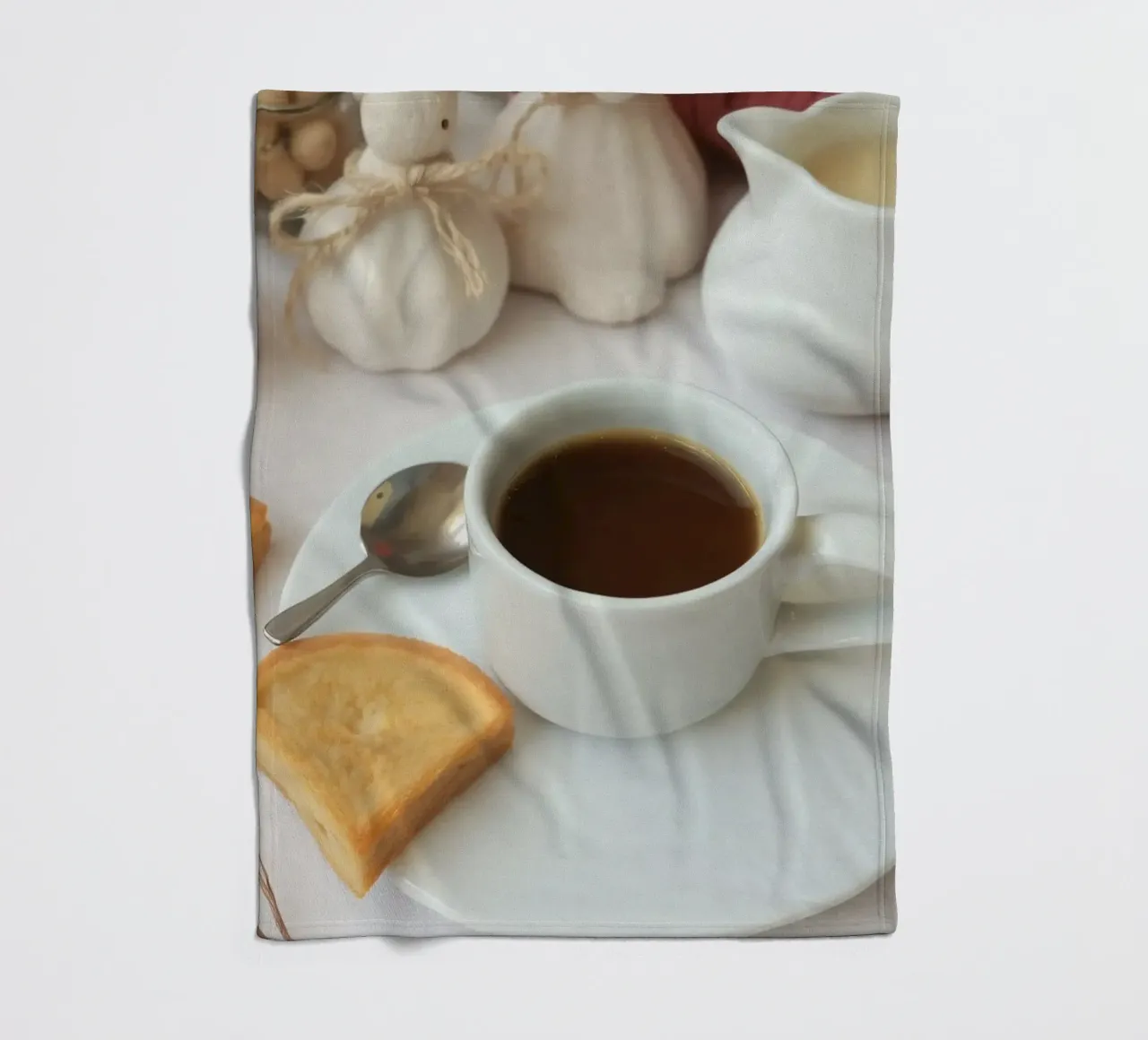 Cozy coffee and cookies setup on a table with warm colors an fleece blanket by DesignDoodle
