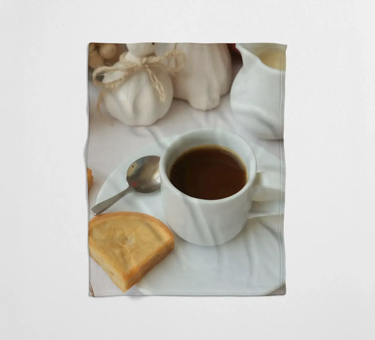 Cozy coffee and cookies setup on a table with warm colors an fleece blanket by DesignDoodle