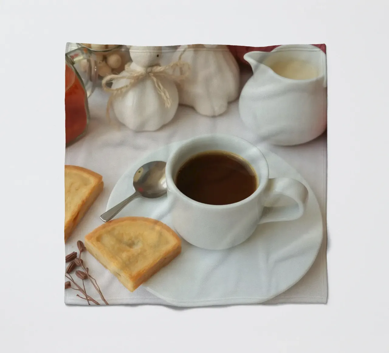 Cozy coffee and cookies setup on a table with warm colors an fleece blanket by DesignDoodle