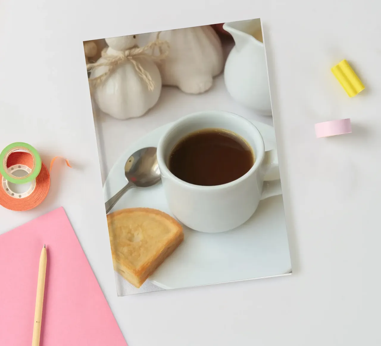Cozy coffee and cookies setup on a table with warm colors an notebook by DesignDoodle