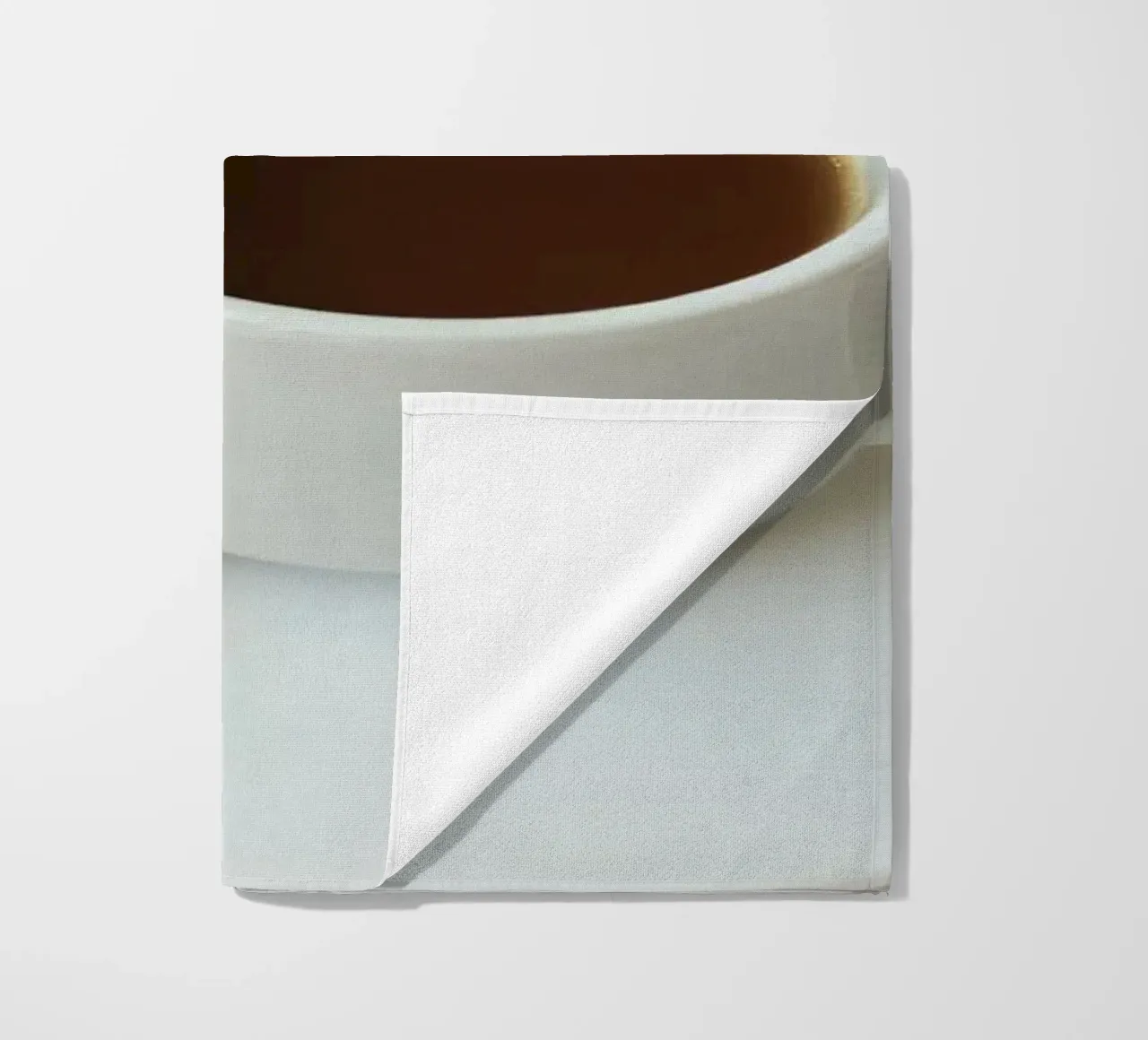 Cozy coffee and cookies setup on a table with warm colors an beach towel by DesignDoodle