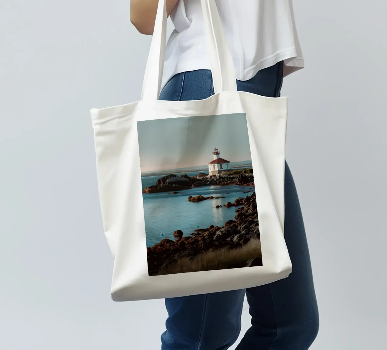 Lighthouse at Sunset tote bag by Indigo Tides Art