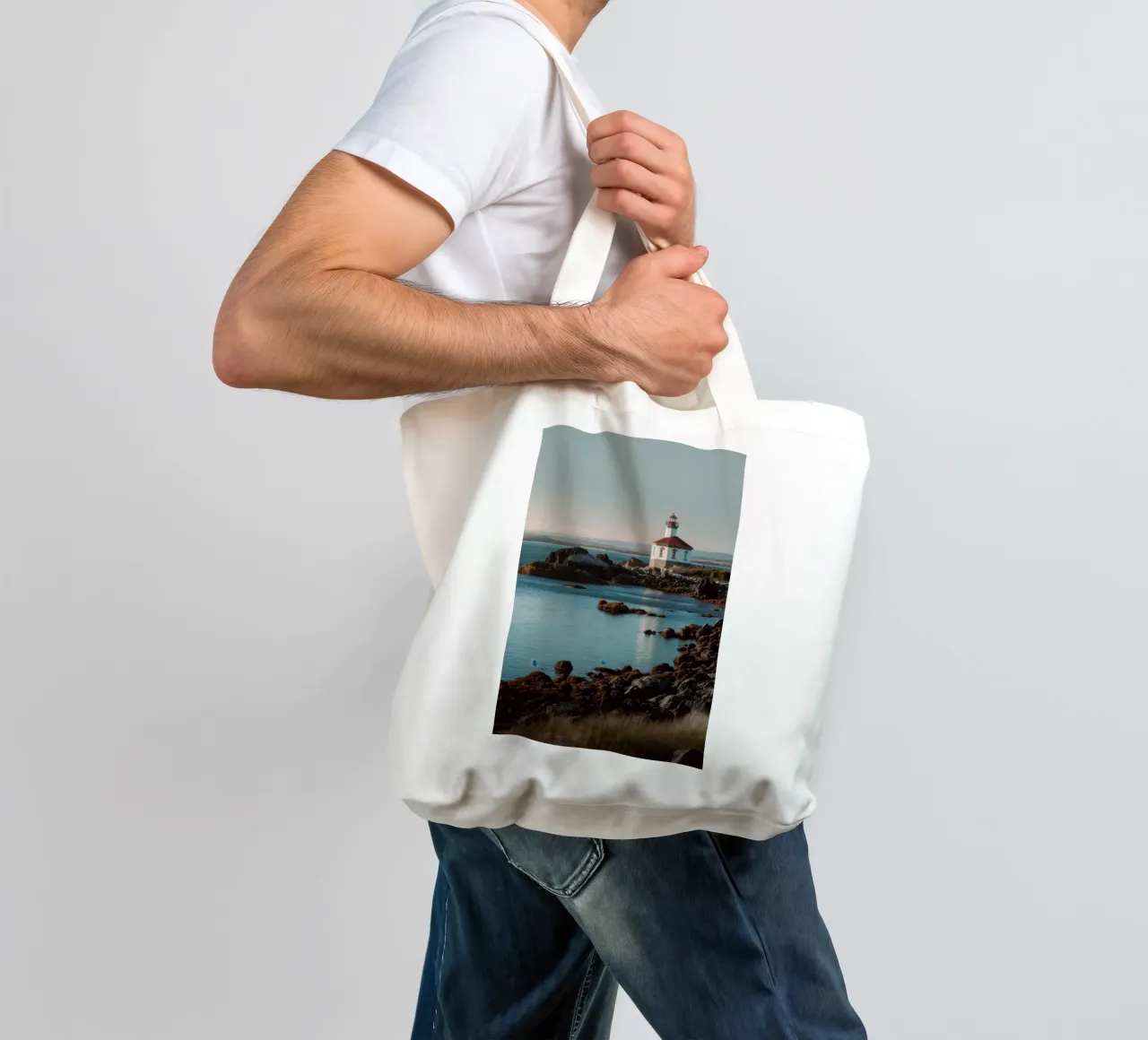Lighthouse at Sunset tote bag by Indigo Tides Art