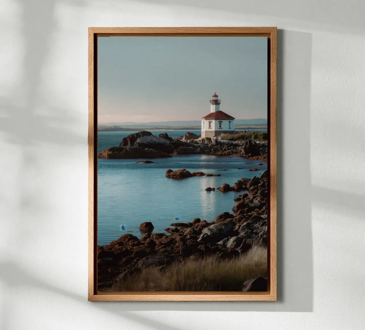 Lighthouse at Sunset canvas with Floater frame by Indigo Tides Art
